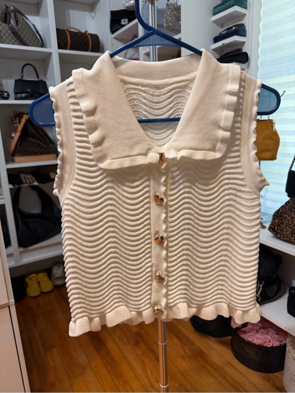 Cream Ruffled Sleeveless Knit Top with Heart Buttons